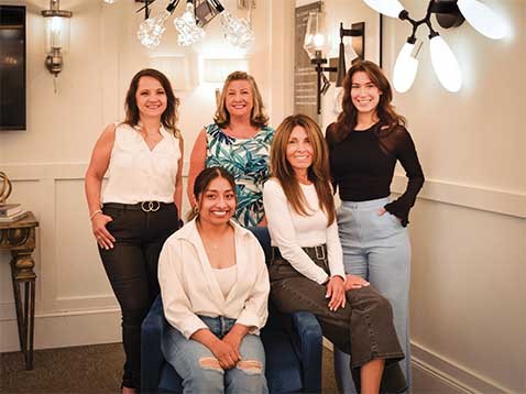 Company staff posing for a photo together